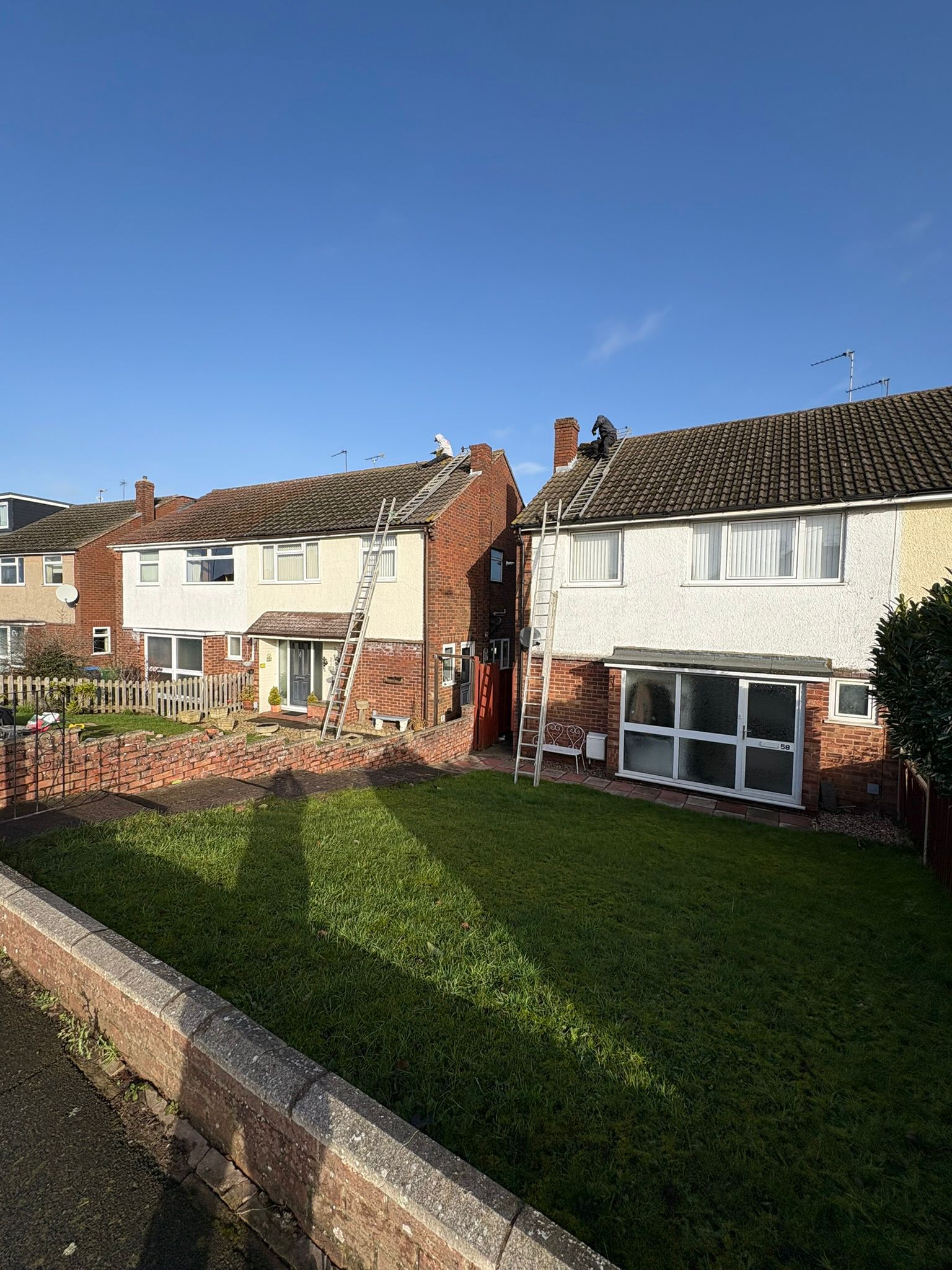 Active Roof Repair – Workers on Site